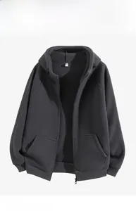 Detailed flat lay of dark grey polar fleece jacket with hood and elastic cuffs