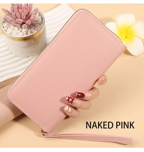 Long litchi grain wallet in naked pink with wristlet and gold zipper detail