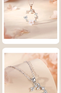 Macro shot of S925 silver petal necklace with heart zircon and mother of pearl floral charm