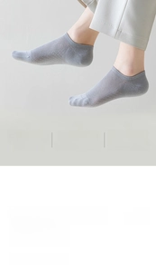 Detail of grey cotton blend low cut socks featuring reinforced toe and breathable mesh
