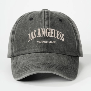 Detail view of vintage Los Angeles 3D embroidery on washed cotton baseball cap