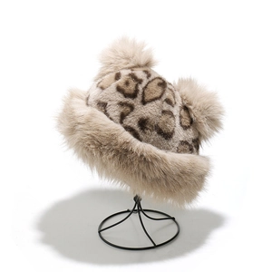 Winter plush leopard print faux fur hat with fluffy texture for warmth and style