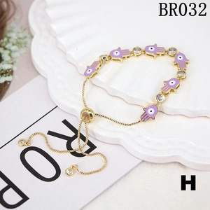 Bohemian gold Hamsa Hand and Evil Eye adjustable bracelet with lavender enamel and zircons