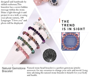 Detail of natural stone bracelets with heart projection stones and emotional gift cards