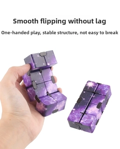 Macro view of purple starry galaxy infinity cube with smooth mechanical folding design