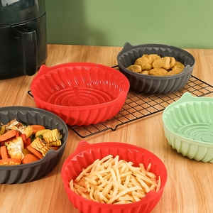 Cestini rotondi in silicone riutilizzabili per friggitrice ad aria con manici colorati