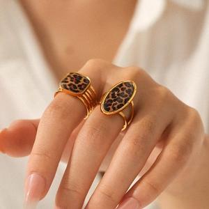 Gold stainless steel leopard print geometric rings with square and oval enamel designs
