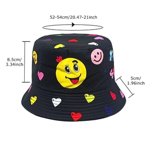 Kids' reversible sun hat with colorful heart and smiley patterns on a black base