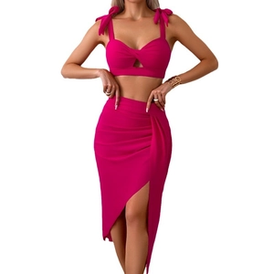 Three-piece rose pink bikini set with bow shoulder straps and side-slit sarong skirt