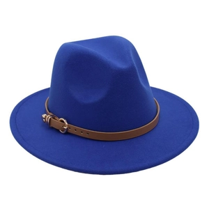 Detail of royal blue wool fedora hat featuring a brown leather band and gold buckle