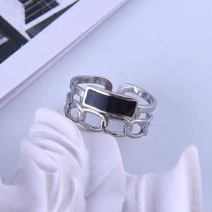Detail of silver dual-layer chain ring with black enamel rectangle on stone decor