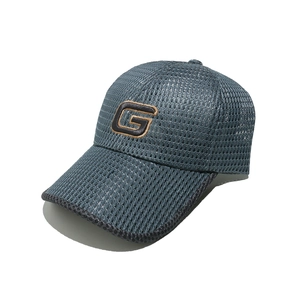 Close-up of deep greyish-blue baseball cap featuring breathable mesh and G-logo patch