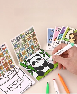 Detail view of cartoon coloring books with acrylic markers featuring animal line art patterns