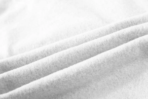 Macro d'une texture de tissu polaire doux et épais sur un survêtement pour hommes