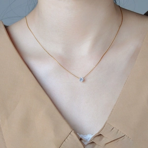 Classic gold titanium steel necklace with a round sparkling solitaire zircon pendant