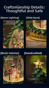 Detail of Christmas tree crystal ball music box with LED lights and resin micro landscape