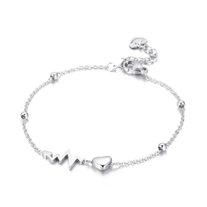 Polished stainless steel heartbeat bracelet with heart charm on white background
