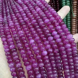 Macro view of polished purple translucent gemstone abacus beads for DIY jewelry making