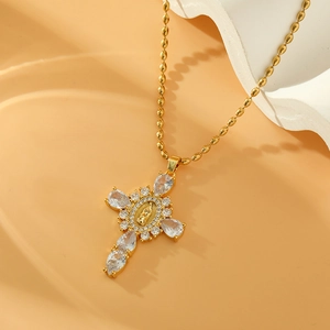 Gold religious cross necklace with virgin mary emblem and micro-set cubic zirconia accents