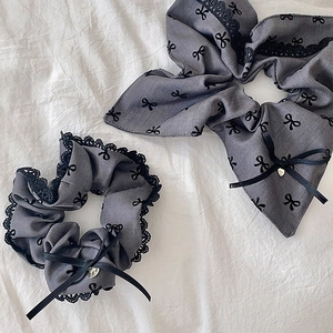 Grey fabric scrunchie set with black bow print and delicate lace trim for hair