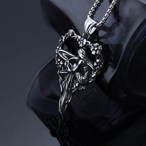 Vintage stainless steel angel pendant necklace with heart-shaped wing carving and box chain