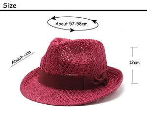 Detail view of pink knit jazz hat with bow showing 57-58cm head size and 4.5cm brim