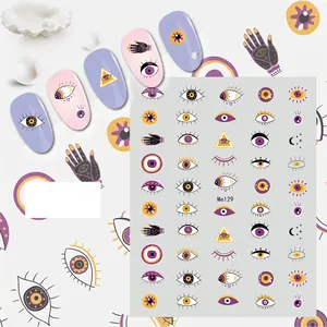 Detail of Me129 Evil Eye nail stickers with purple mystical symbols and stars