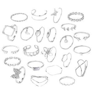 Bohemian style 24-piece silver ring set with butterfly, pearls, and star elements