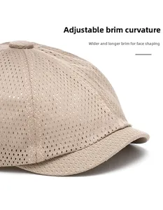 Close-up of beige breathable mesh hat featuring a flexible wide brim for face shaping