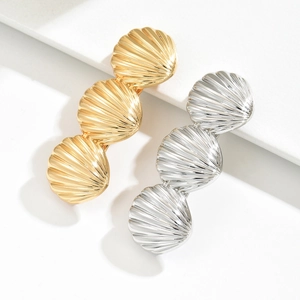 Elegant gold and silver metallic shell hair clips set with premium textured finish