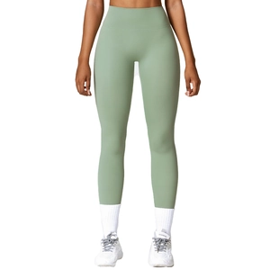 High waist compression yoga leggings in light sage green for fitness and running