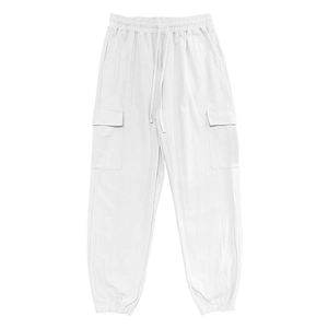 Detail view of cotton linen joggers featuring elastic waist and functional side pockets