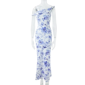 Detail of slim fit one shoulder floral maxi dress with white and blue porcelain pattern