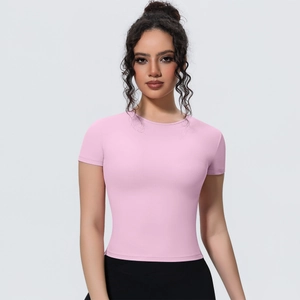 Close-up of pink slim-fit yoga T-shirt showing breathable fabric and round neck detail