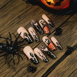 Halloween coffin fake nails with black spider webs pumpkin and orange flame designs