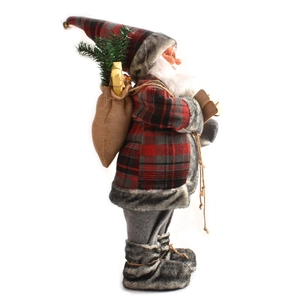 Detail of 45cm Santa doll in red plaid outfit holding a sack of gifts and pine branches