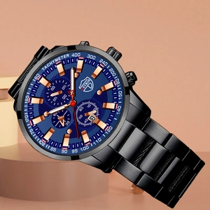 Detail of chronograph dial with blue face and luminous rose gold hands on black steel watch