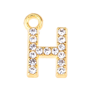Detail view of gold alloy letter H pendant encrusted with sparkling rhinestones