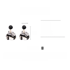Detail view of resin flower earrings showing dimensions 6.3cm length and 4cm width