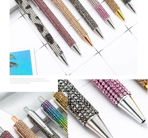 Detail view of rhinestone ballpoint pens in leopard, gold, and pink crystal finishes