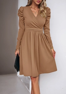 Close-up of khaki V-neck dress featuring elegant puff sleeves and a cinched waist design