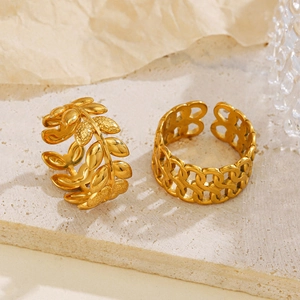 Adjustable gold plated stainless steel rings with leaf and geometric chain link designs