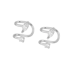 Detail view of double-layered silver ear cuffs with marquise and round crystal inlays