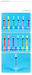 Macro detail of 10ml colored syringe feeder with dual scale markings for pet medicine