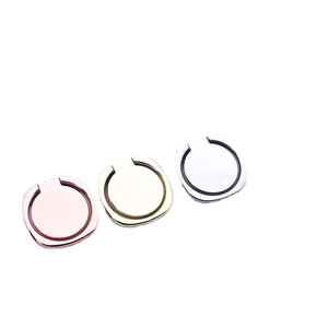 Polished metal phone ring holders in rose gold, gold, and silver finishes with 360 rotation