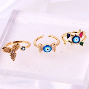 Three-piece gold adjustable ring set with evil eye butterfly and colorful zircons