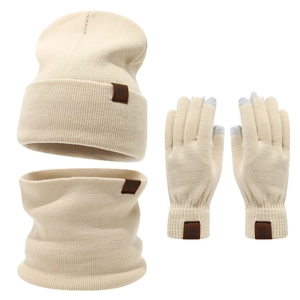 Beige knitted winter set including pompom hat, scarf, and touchscreen gloves with snowflake patch