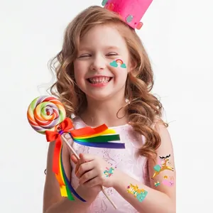 Tatouages temporaires dorés pour enfants avec motifs de château licorne et arc-en-ciel