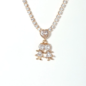Golden hip hop necklace featuring heart pendant and two girl charms with sparkling crystals