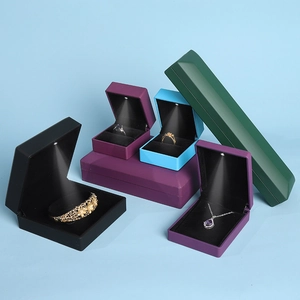 Modern LED jewelry box collection featuring ring and necklace boxes in vibrant colors